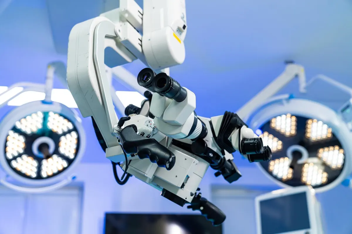 Surgical microscope in an operating room, like the one used in microsurgical varicocelectomy